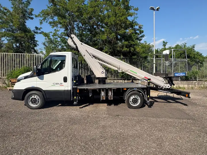 Cela Essential 18T stabilised with the boom raised in front of the CELA Industry factory